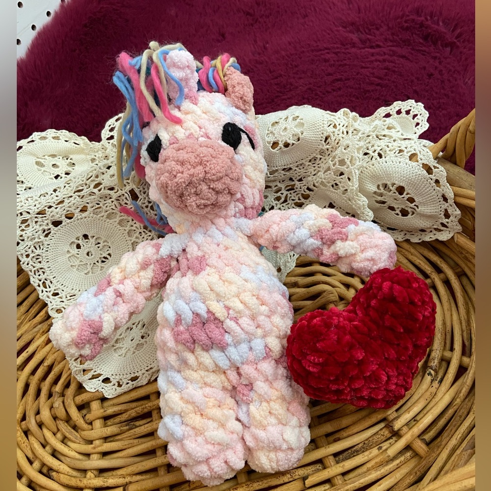 Crochet unicorn plushie
Handmade 
Color pink
Size about 10 inches